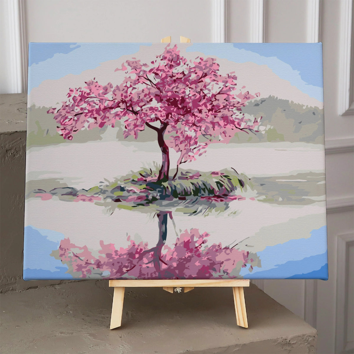 Pink cherry blossom tree with lake reflection and serene landscape painting