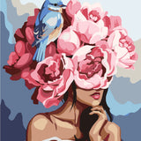 Surreal painting of a woman with flowers and a bluebird
