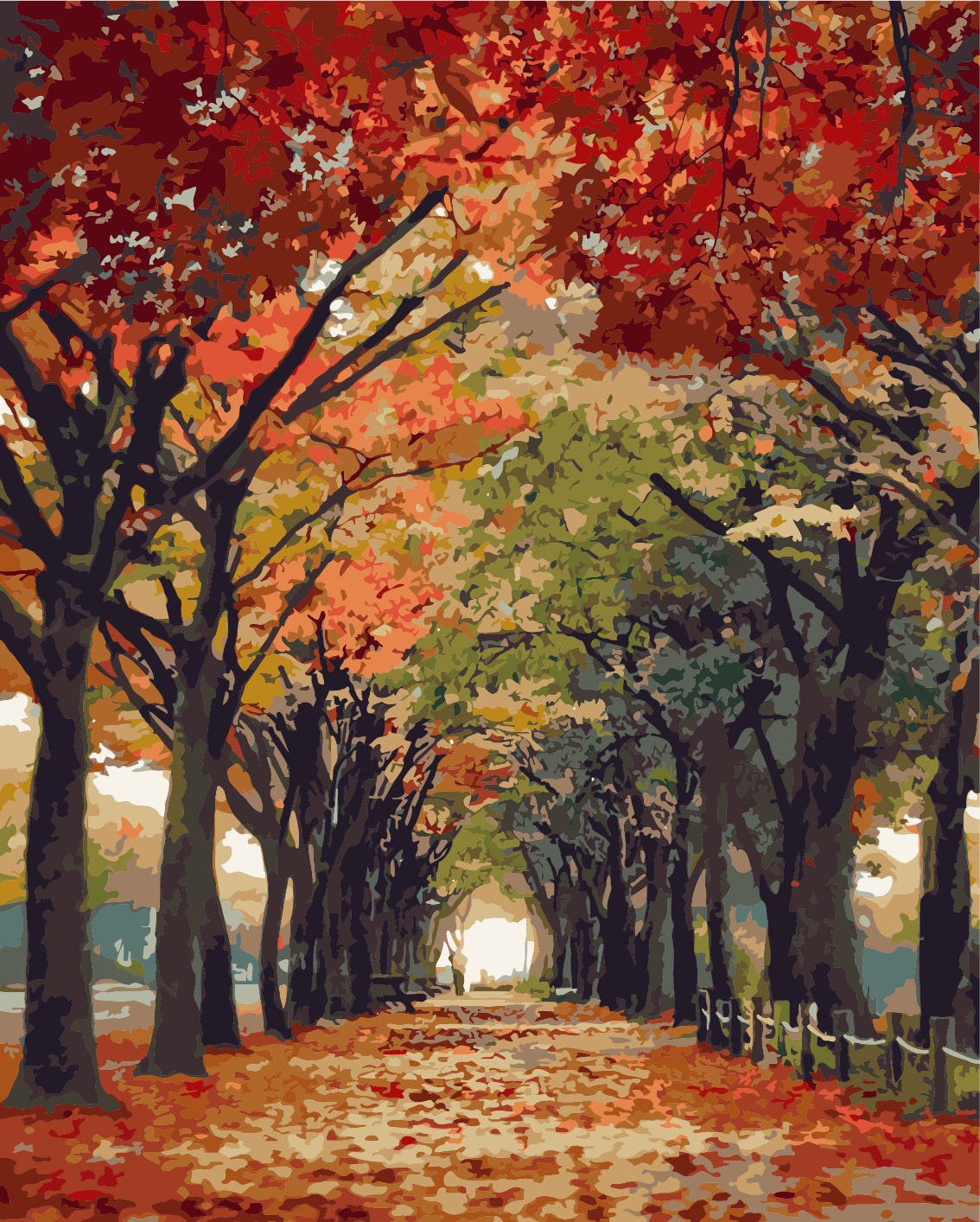 Autumn pathway lined with colorful trees and fallen leaves
