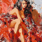Elegant woman in red feathered gown with expressive artistic details