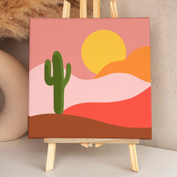 Painting of a desert landscape with a cactus and sunset