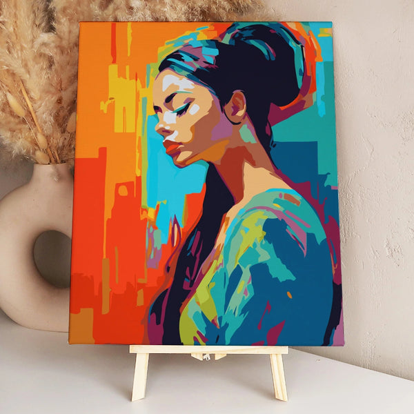 A colorful portrait of a woman with closed eyes and serene expression