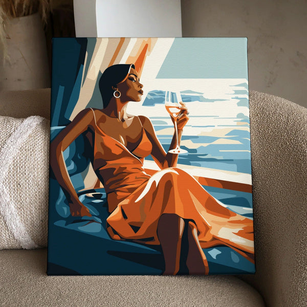 Sophisticated woman in orange dress enjoying wine with ocean view