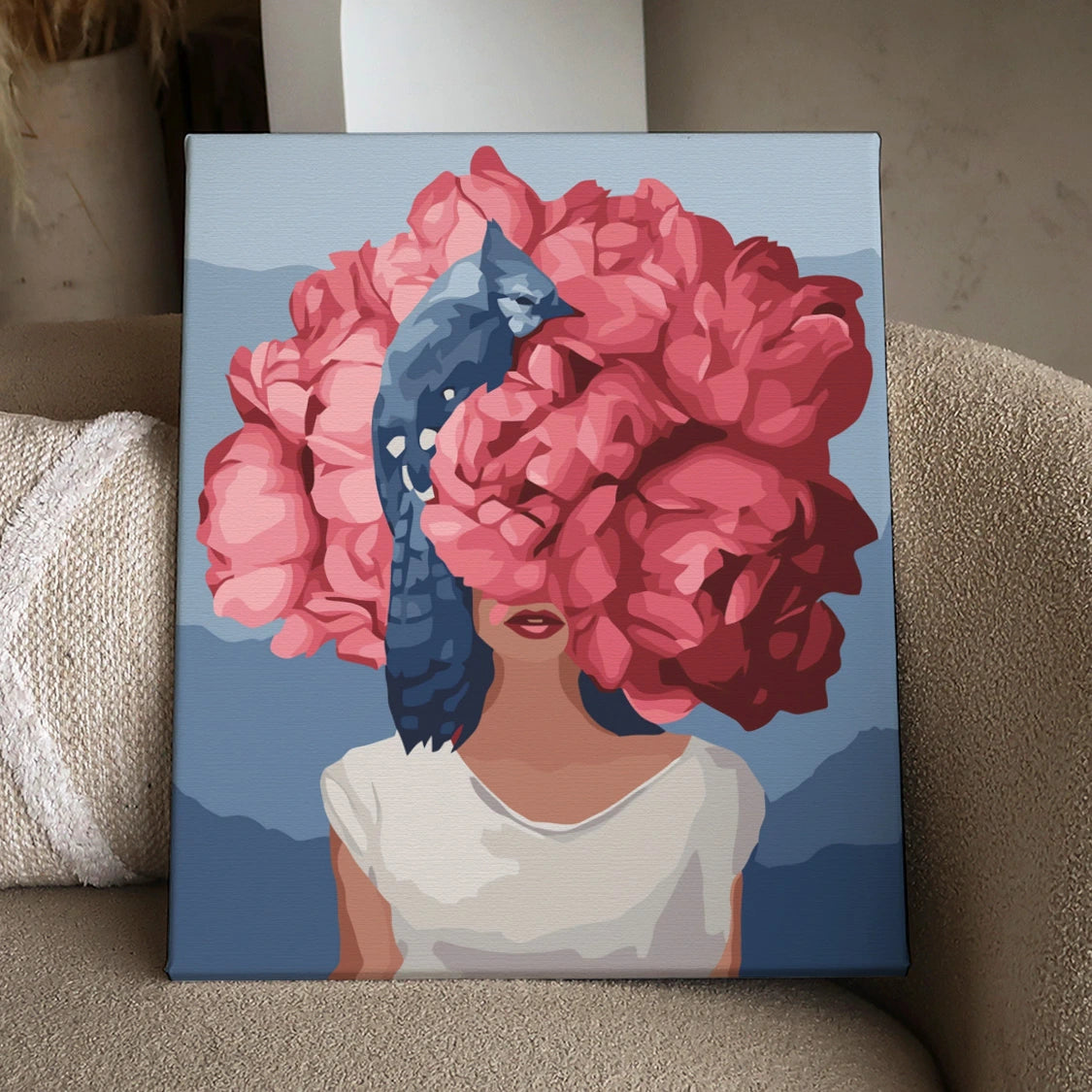 Surreal portrait of woman with floral head and blue jay