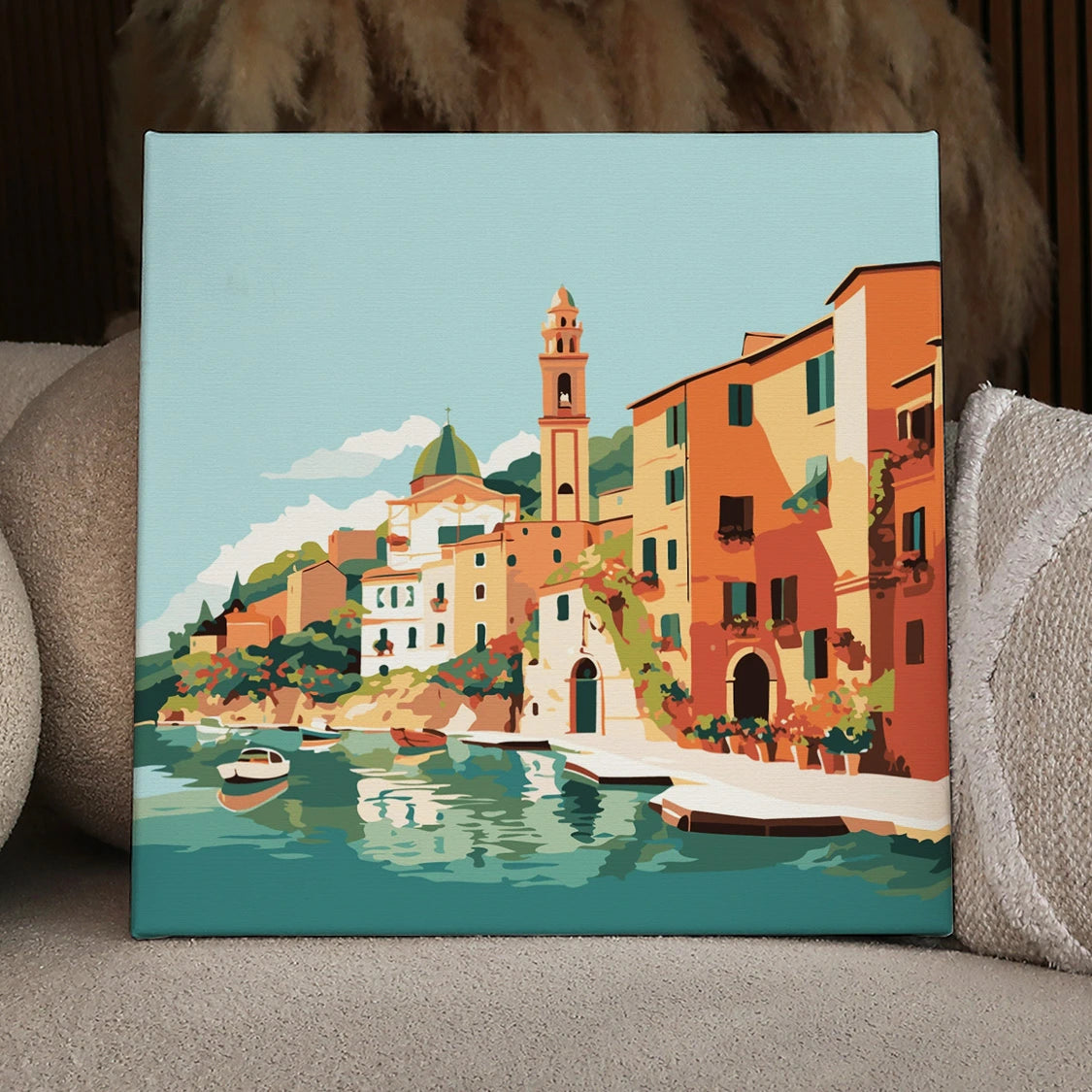 Scenic Mediterranean village with colorful buildings and boats on water