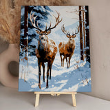 Two majestic deer standing in a snowy winter forest scene