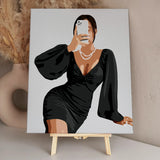 Stylish woman in black dress taking a mirror selfie