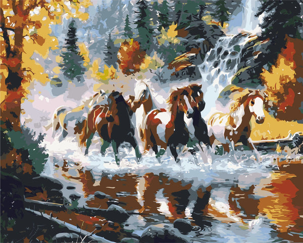 Wild horses galloping through a river with waterfall and autumn trees
