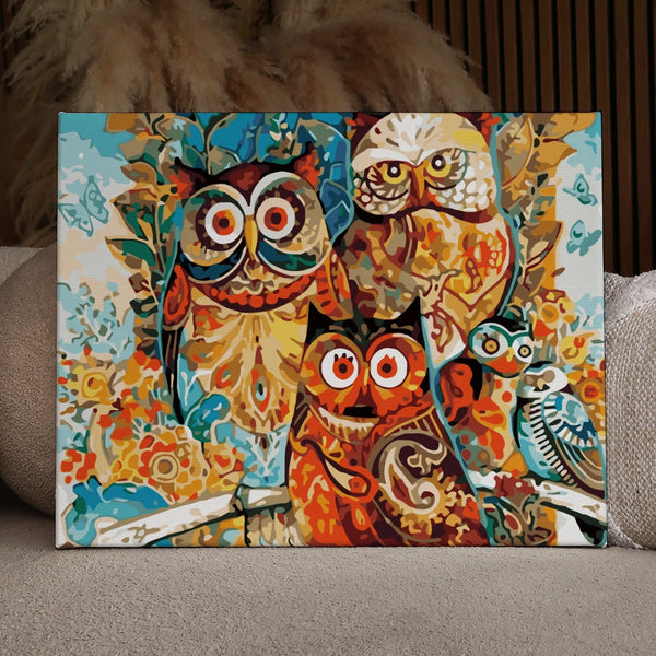 Colorful abstract painting of owls with intricate patterns and details