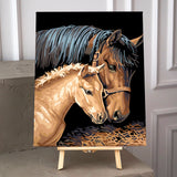 Tender moment between a father horse and his son foal