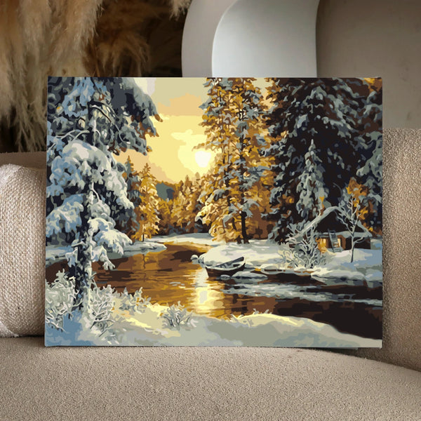 Winter landscape painting with snow-covered trees and golden sunset