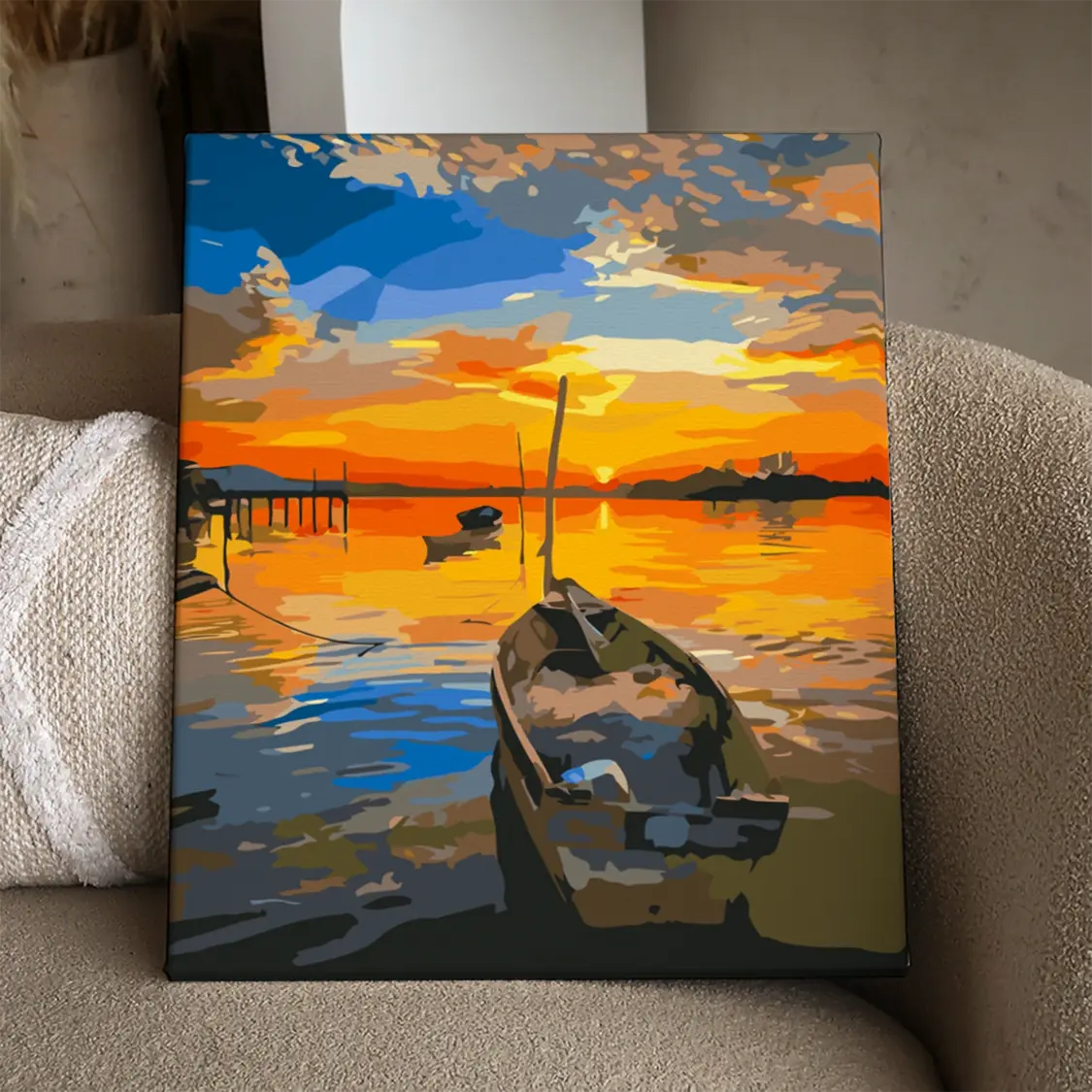 Colorful sunset painting with a boat on calm water