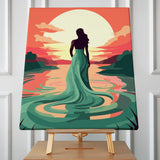 Silhouetted woman in flowing dress standing before a sunset lake