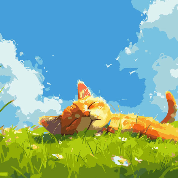Orange cat relaxing on a grassy field under a blue sky