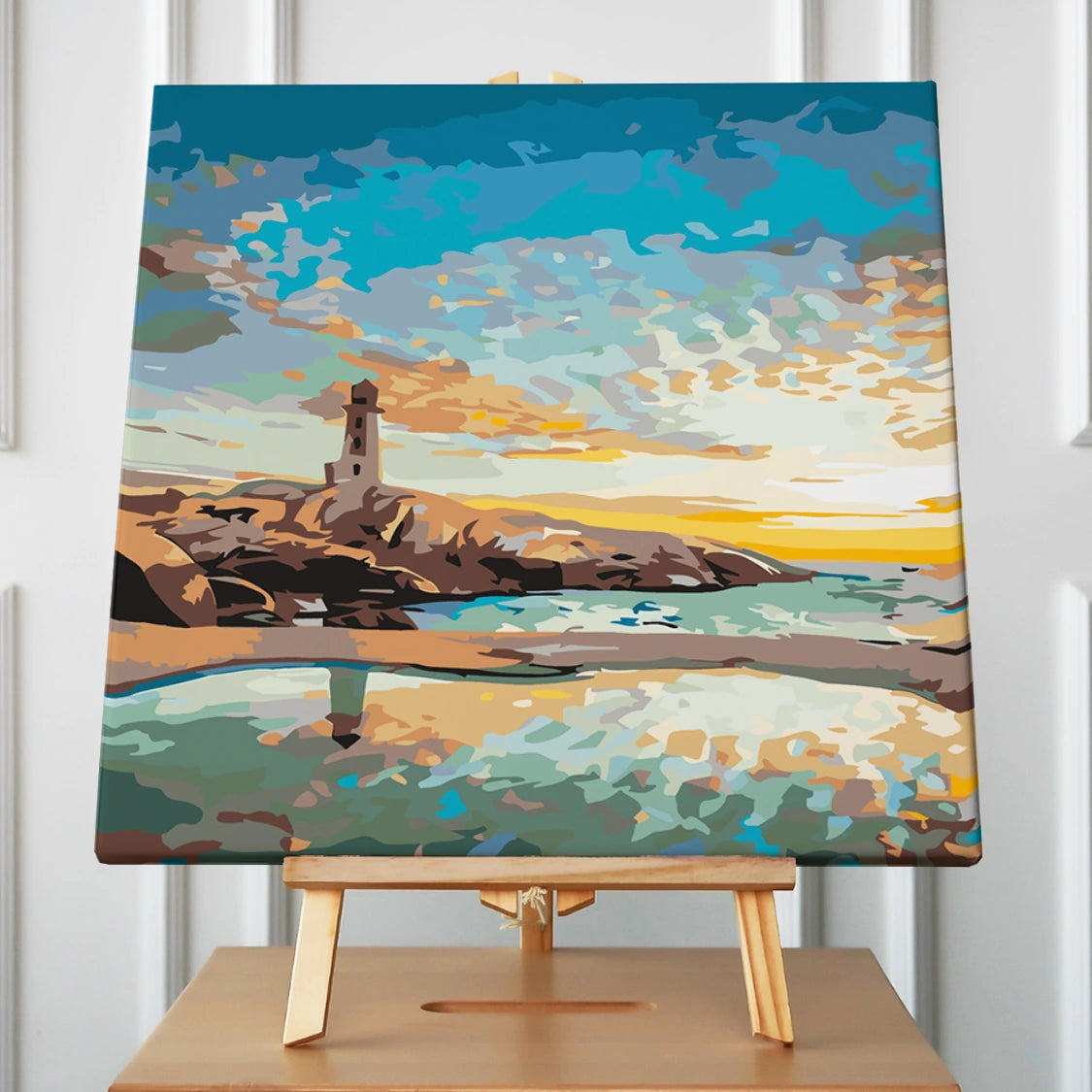 Scenic lighthouse painting with ocean reflection and colorful sunset sky
