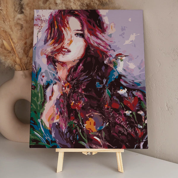 Expressive portrait painting of a woman with flowing colorful hair