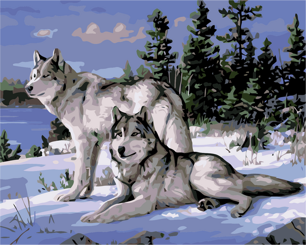 Two wolves in a snowy forest with a lake background