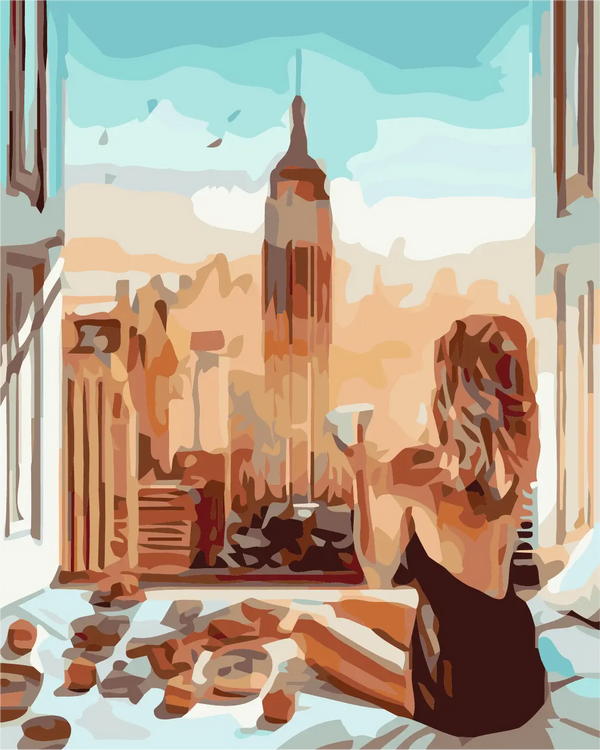Woman enjoying coffee in bed with Empire State Building view
