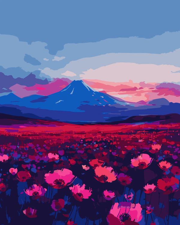 Colorful field of vibrant pink flowers with a mountain backdrop