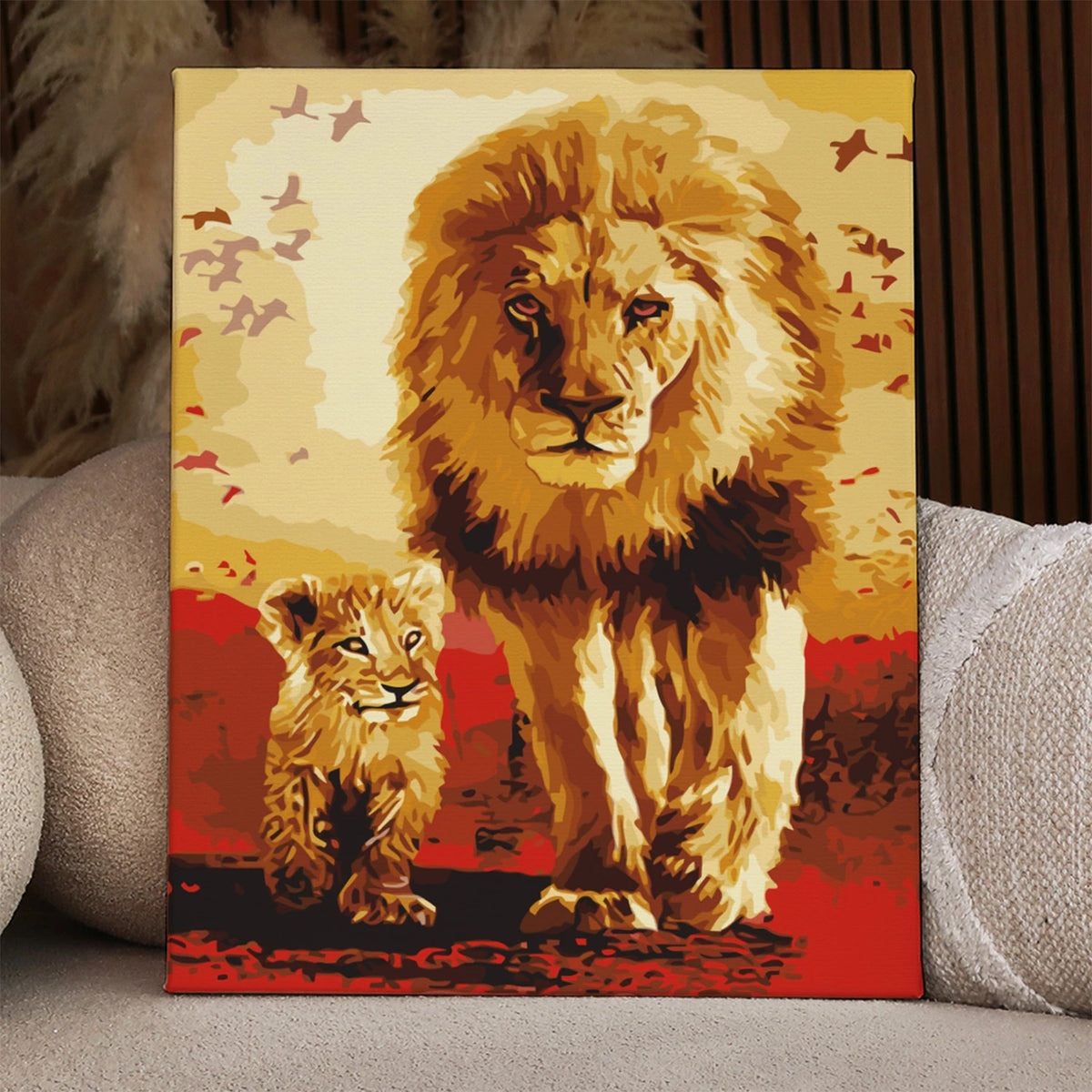 Painting of a majestic lion and cub walking in the savanna