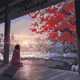 Painting of a woman sitting on a porch admiring winter scenery