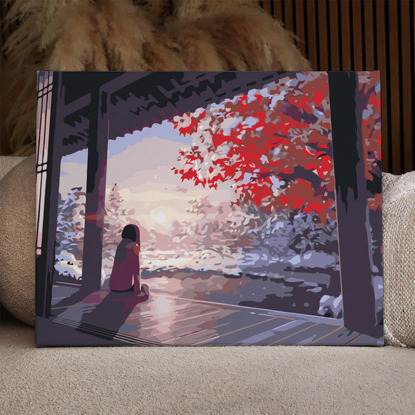 Painting of a woman sitting on a porch admiring winter scenery