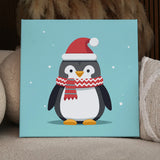 Cute penguin wearing Santa hat and scarf in snowy background