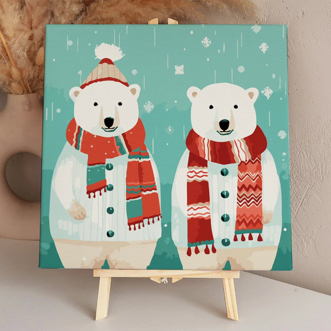 Two polar bears in winter clothes with scarves in snowy painting