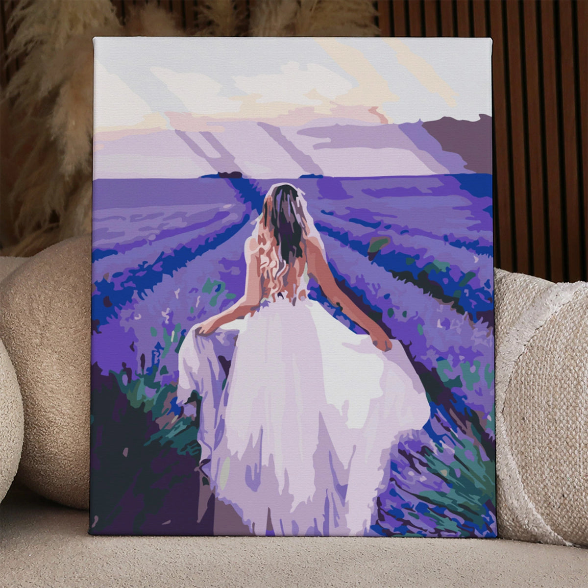 Woman in white dress walking through lavender field at sunset painting