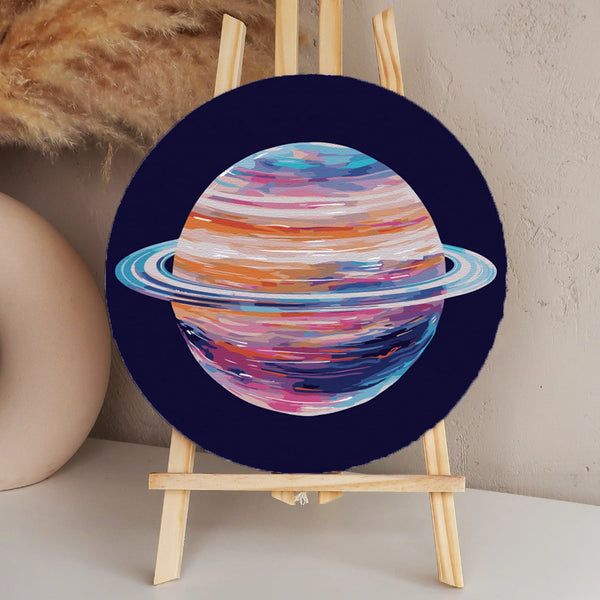 Colorful abstract painting of Saturn with vibrant rings in space