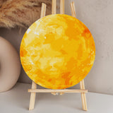 Bright artistic painting of the sun with textured yellow hues