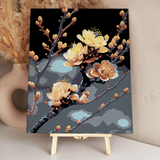 Stylized painting of golden blossom flowers on dark branches