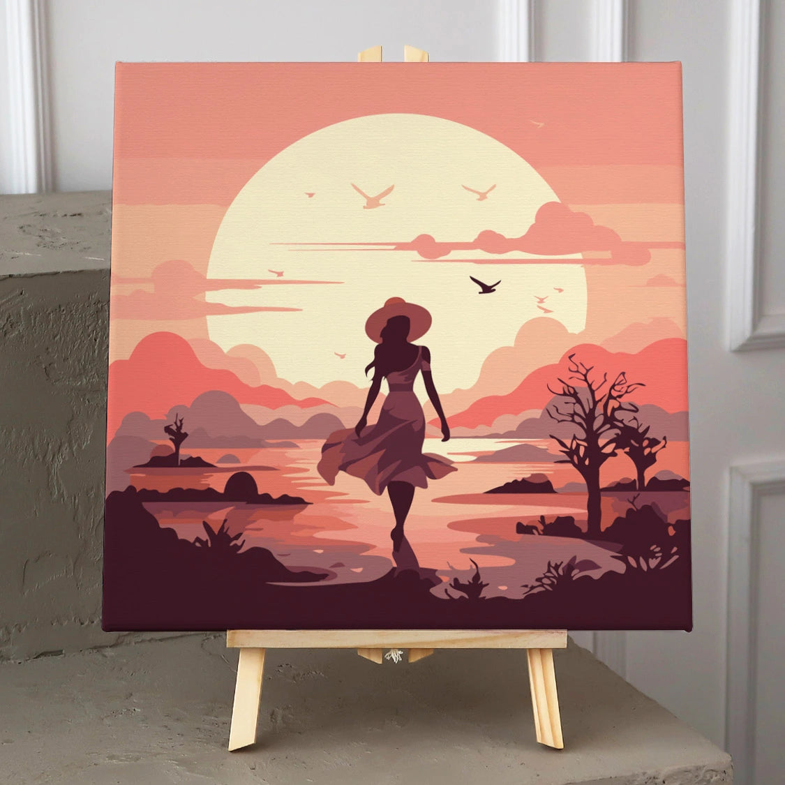 Silhouette of a woman walking towards a sunset over water