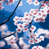 Stylized painting of cherry blossoms against a bright blue sky