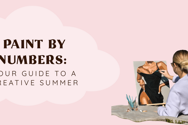 pink background with text in a beige cloud "paint by numbers your guide to a creative summer" and a girl on the right painting a painting on a duvet