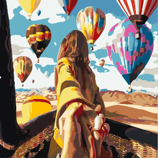 Romantic painting of a couple with hot air balloons overhead