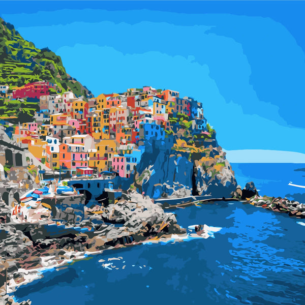 Colorful coastal village on cliffs overlooking the deep blue sea