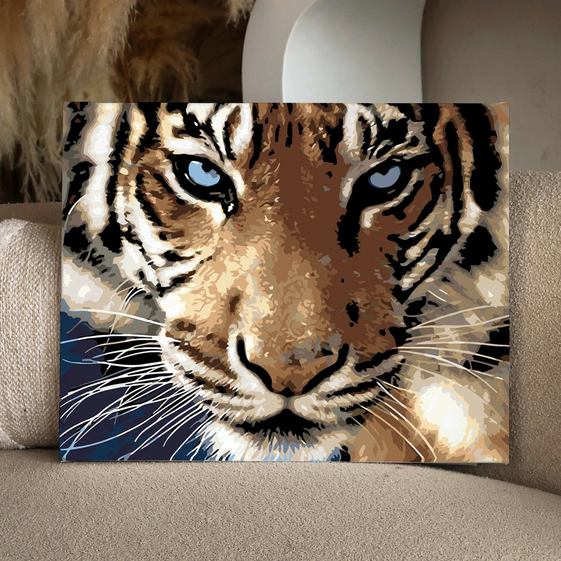 portrait of a close-up bold tiger face with blue eyes