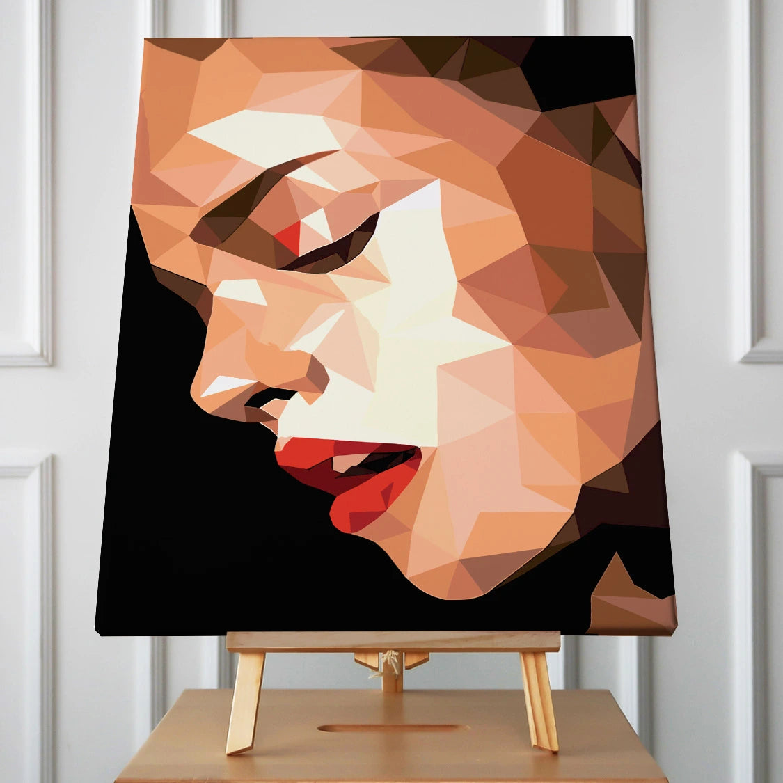 Abstract low-poly portrait of a woman with red lips