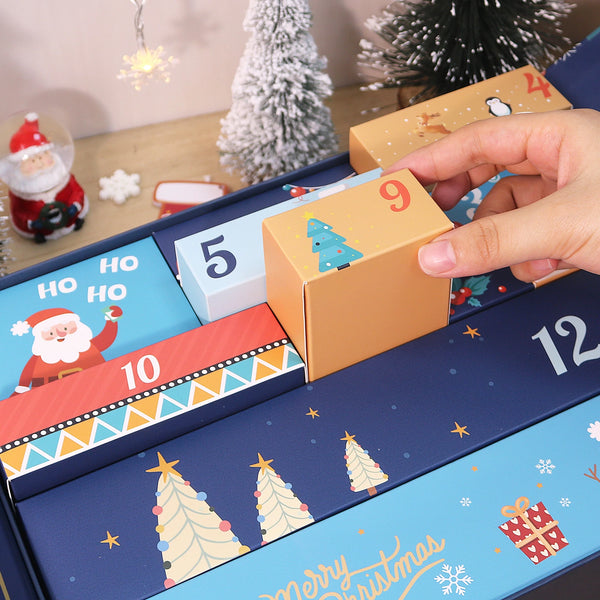 ArtSpark Christmas Advent Calendar with numbered gift boxes and a hand opening box number 9.
