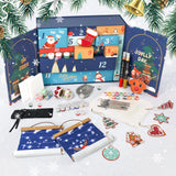 ArtSpark Christmas Advent Calendar opened with paint sets, brushes, ornaments and creative tools displayed.