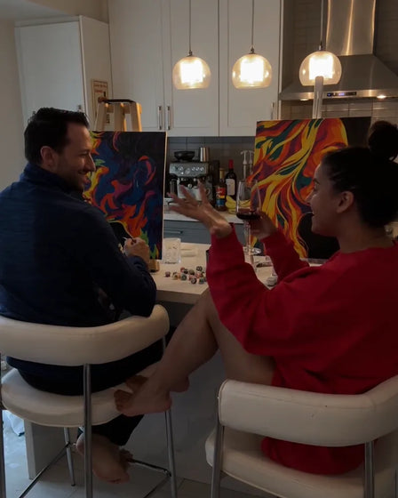 ArtSpark customer with their finished paint by numbers canvas