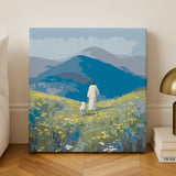Finished Quiet Fields paint by numbers artwork of Jesus walking through a wildflower meadow with mountains in the background