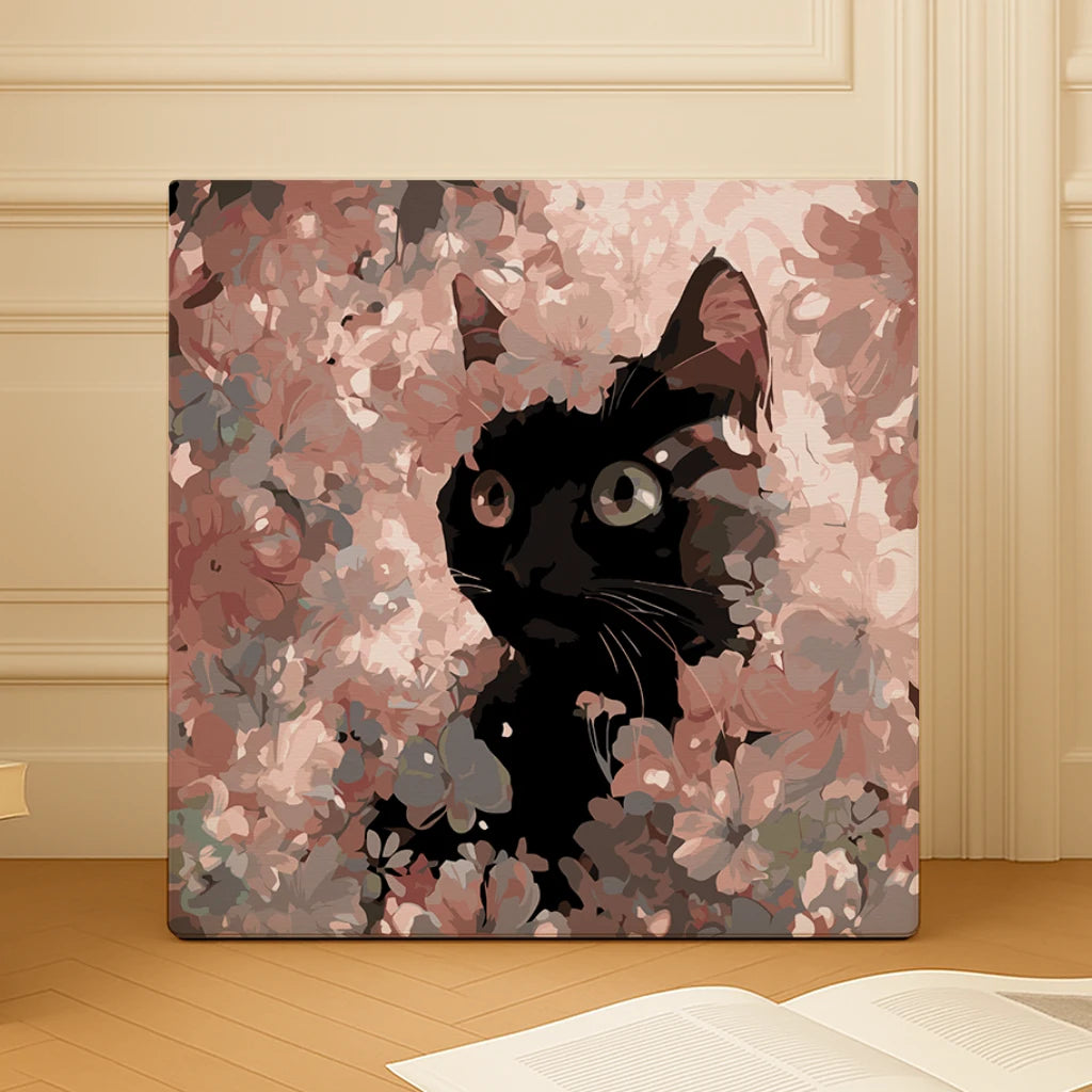 Finished Soft Bloom Kitty paint by numbers artwork showing a black cat surrounded by pink blossoms