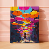 Colorful umbrella installation above a narrow urban street with a woman walking below, paint by numbers artwork