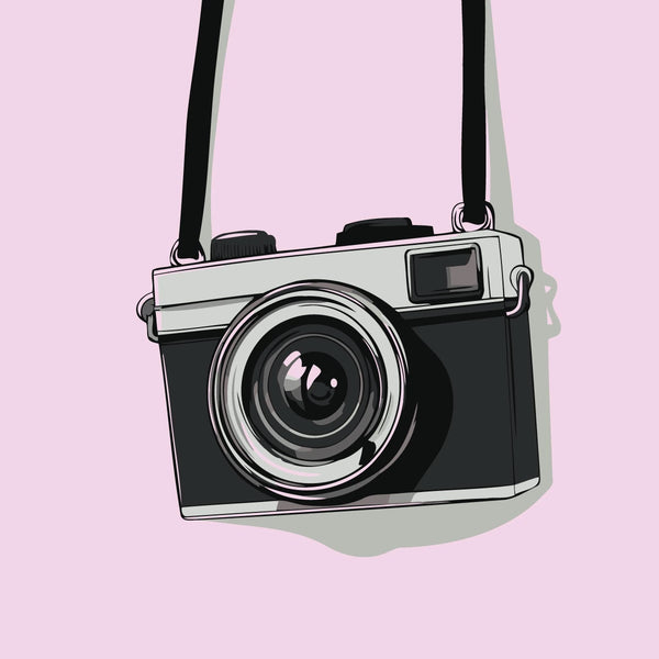 Vintage camera illustration with black strap on pastel pink background