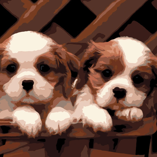 Painting of two Cavalier King Charles Spaniel puppies in a basket