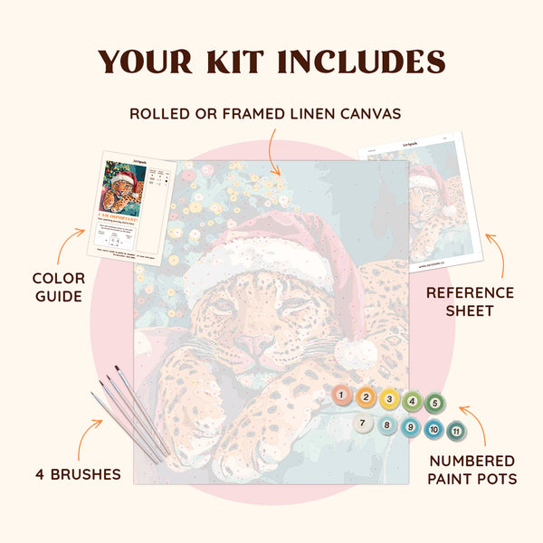 Christmas Paws paint by numbers kit including pre-numbered canvas, brushes, and paints featuring a festive leopard design.