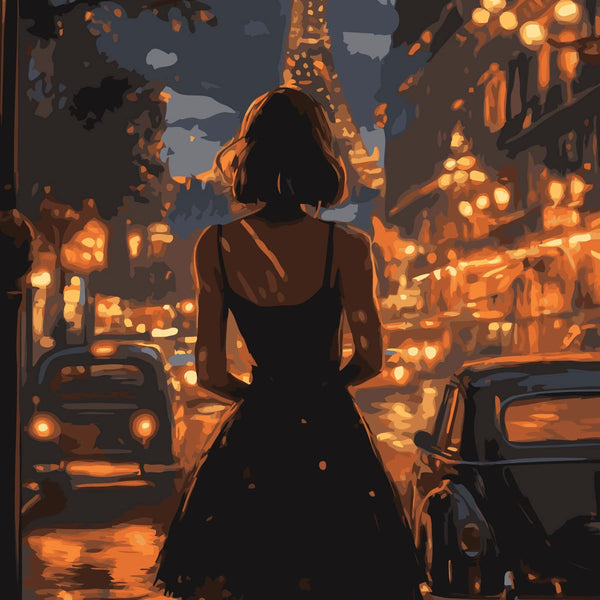 Woman in black dress walking through Paris streets at night