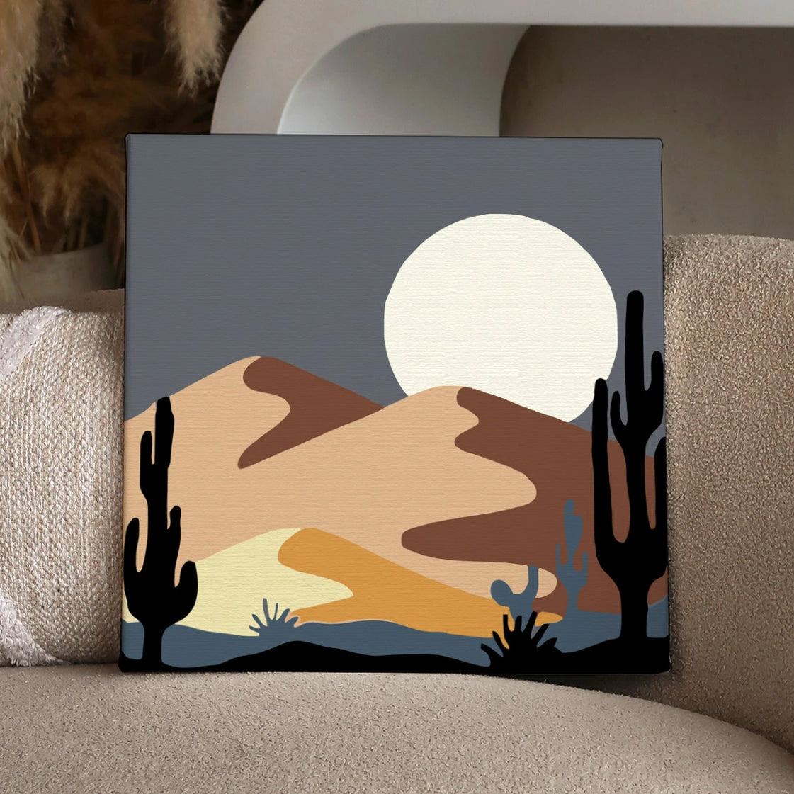 Minimalist desert landscape with cacti, rolling dunes, and full moon